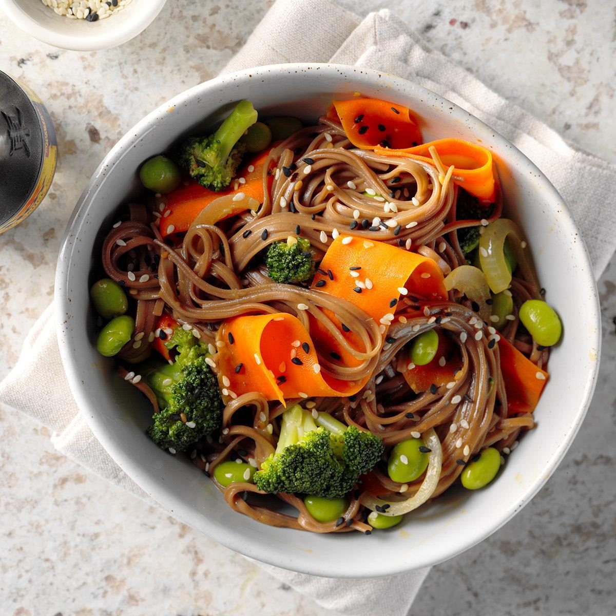 bowl of soba noodles and edamame for a Japanese new year's tradition
