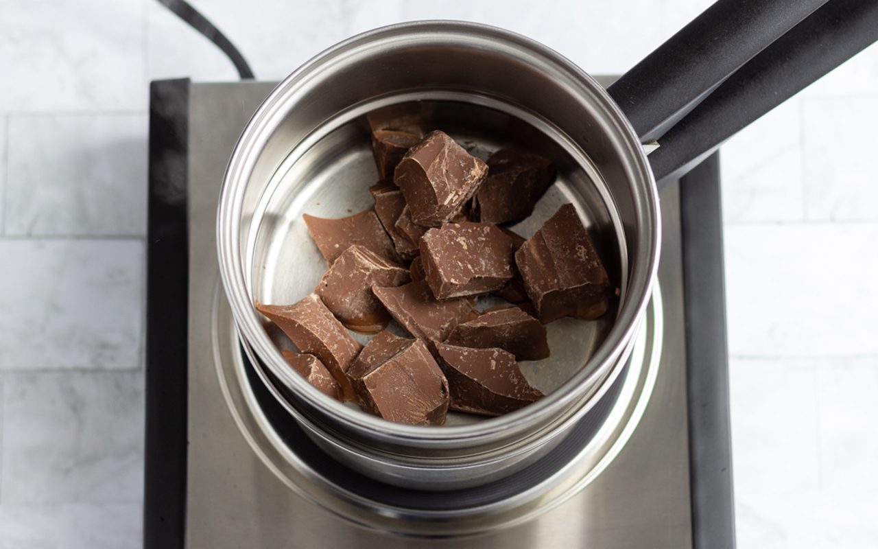 Melt some of the chocolate How To Temper Chocolate.tasteofhome.nancy Mock 2