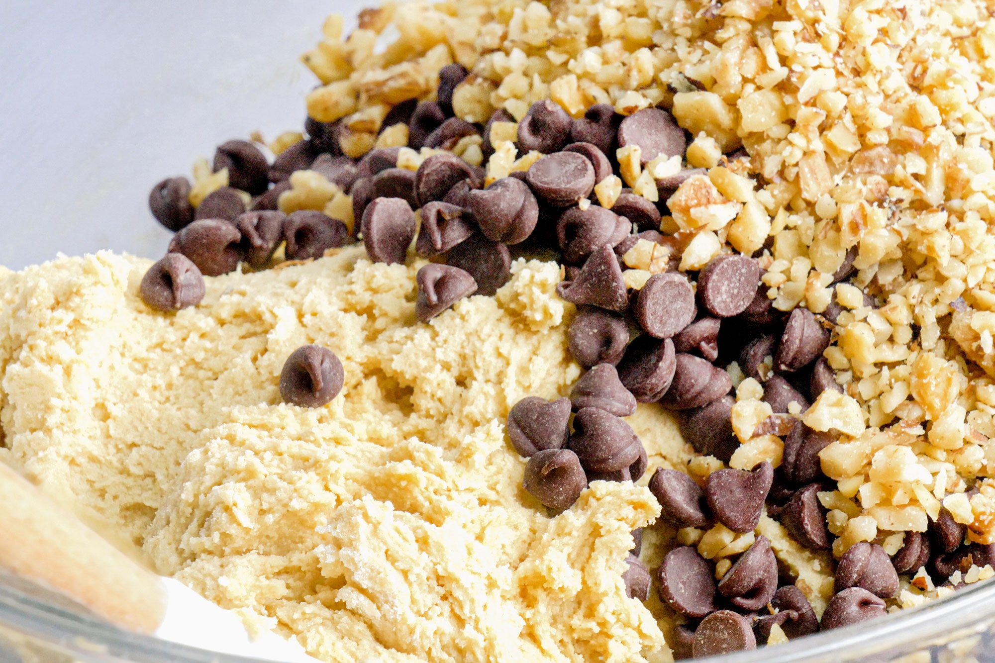 Fold chocolate chips and walnut in dough