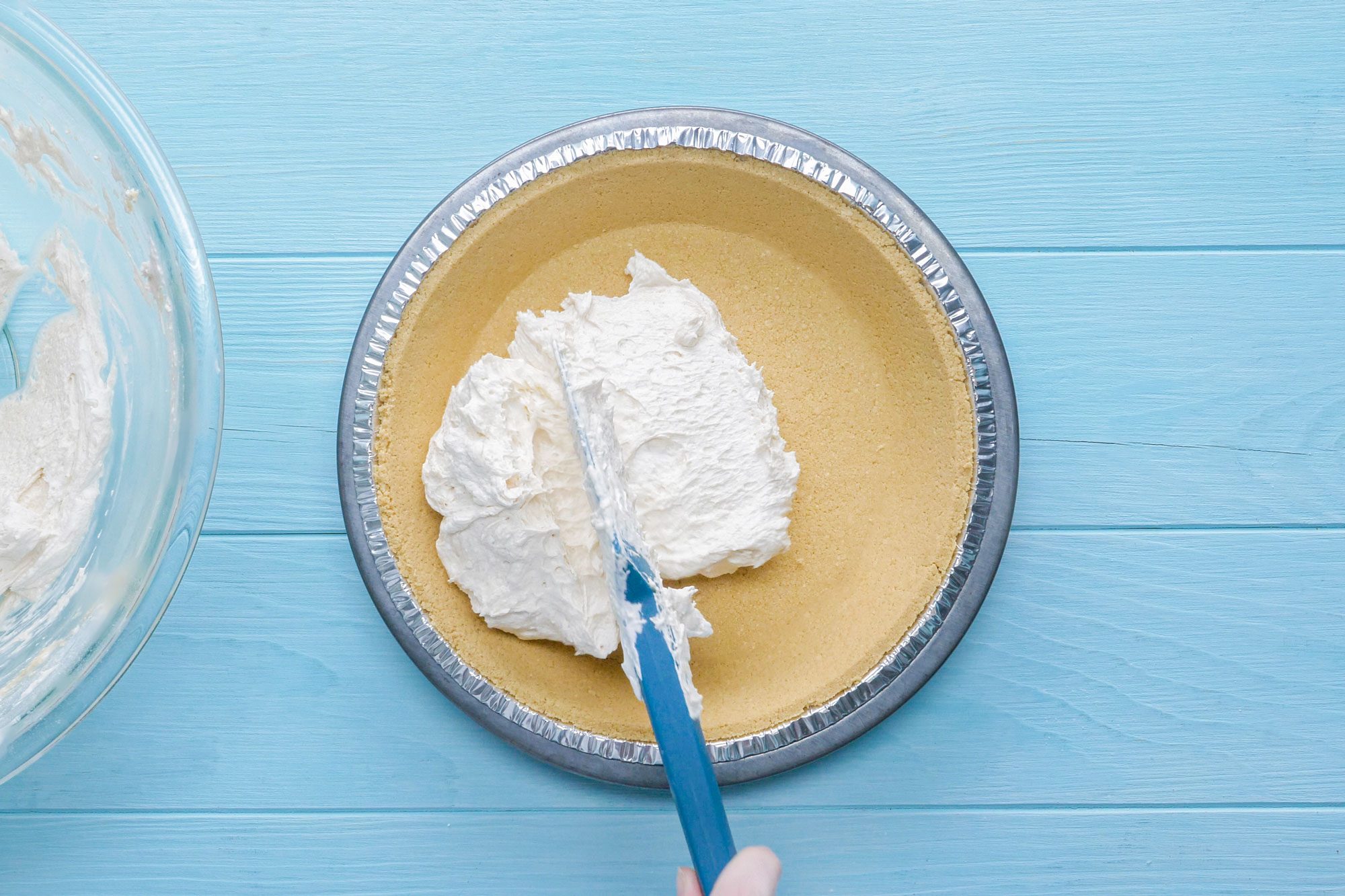 Add whipped thawed topping into the mixture with spatula