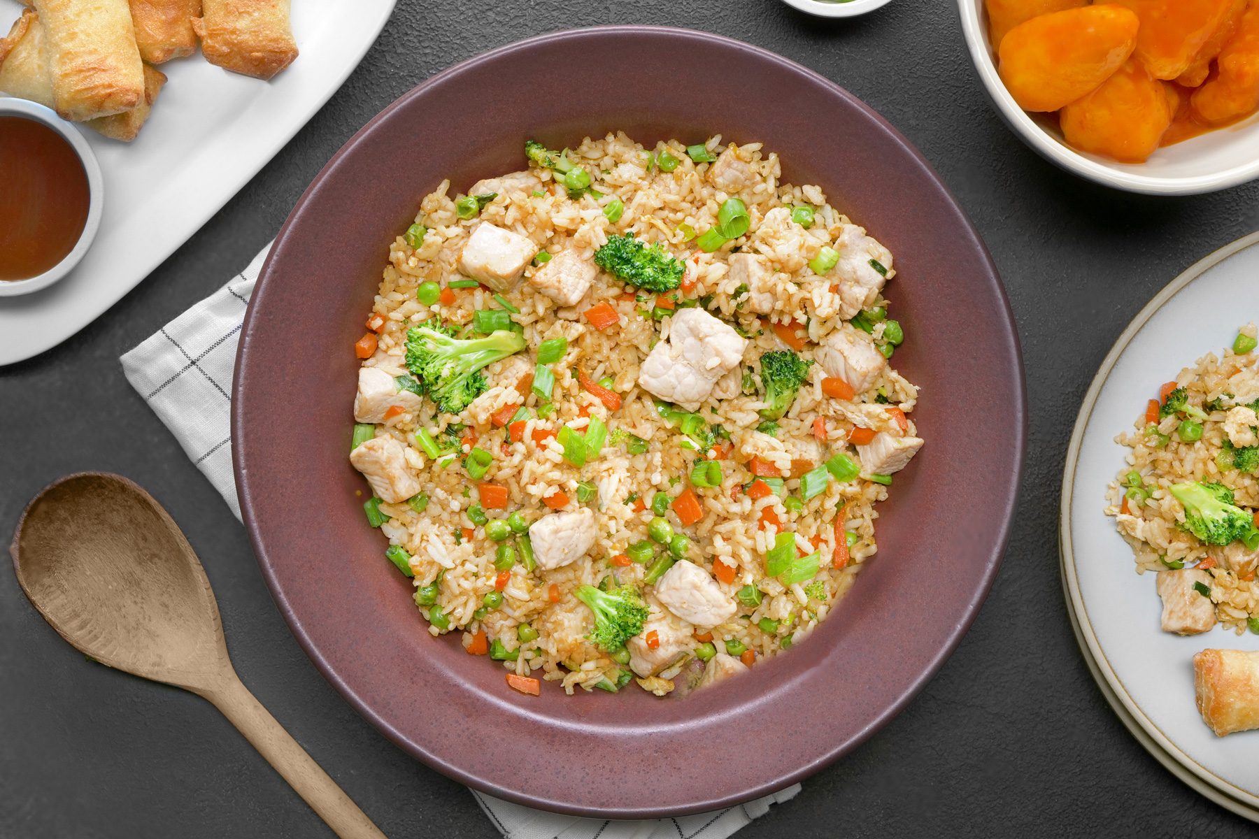 Pork fried rice with chicken and vegetables.