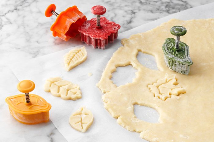 Cookie Dough With Molds on a Marble Surface