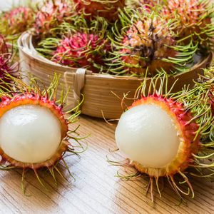 Fresh rambutan on wood background