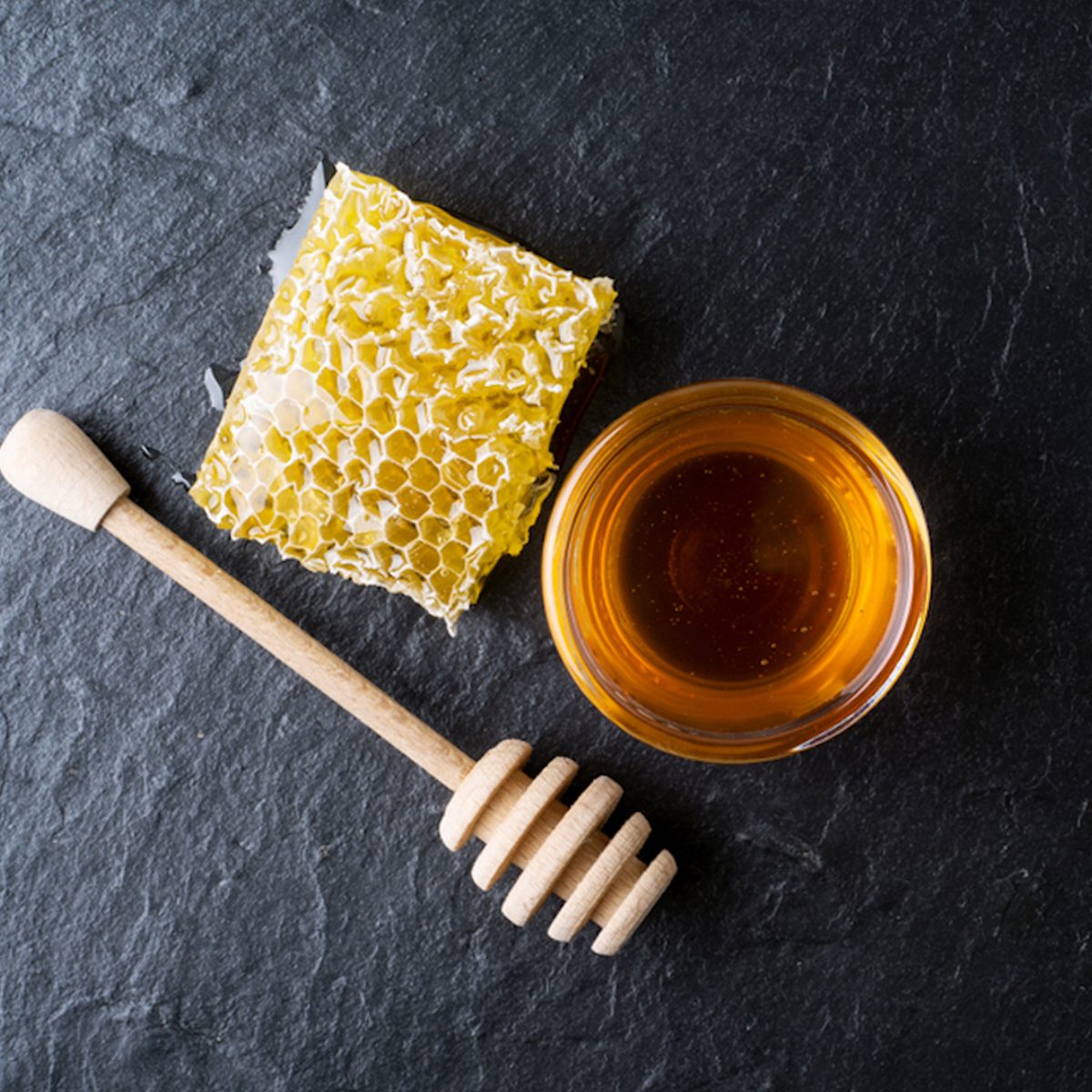 Honey on gray counter