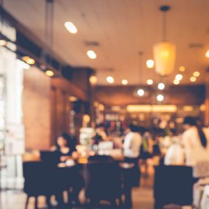 Blur coffee shop or cafe restaurant with abstract bokeh light image background. For create montage product display