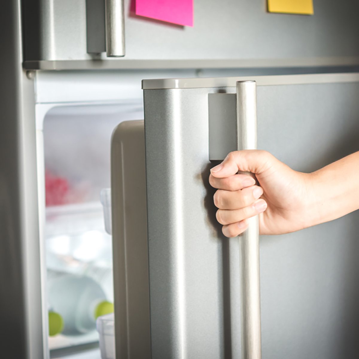 opening a refrigerator door