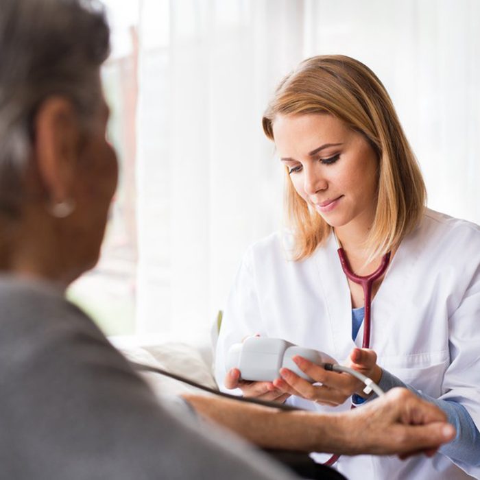 Doctor checking her patient's numbers