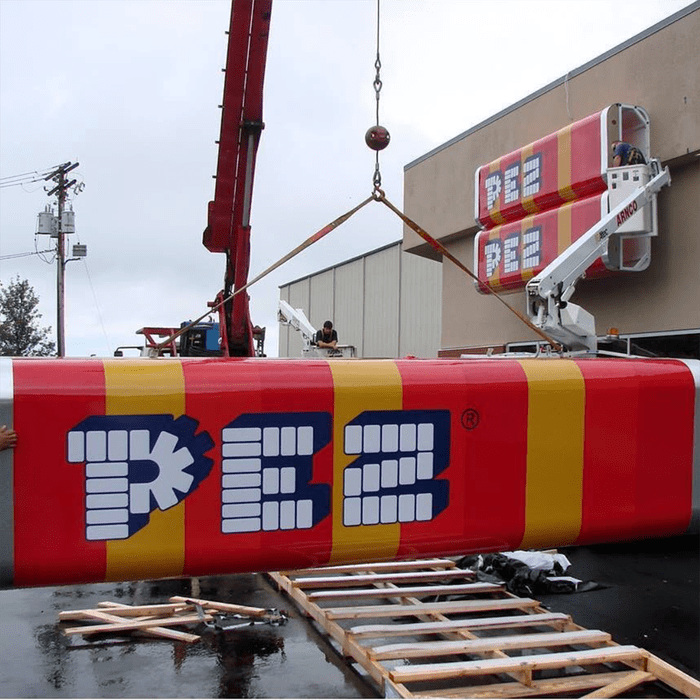 Huge signs shaped like pez candy