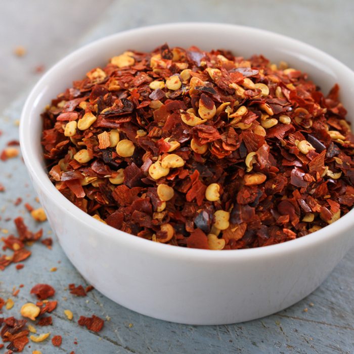 crushed red chillies in white dish