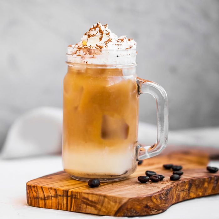 Ice coffee cup with cream.