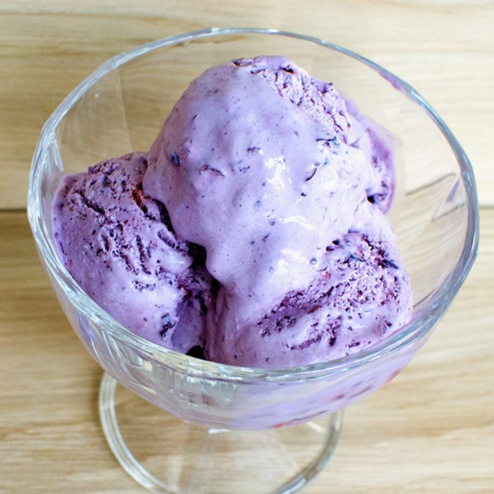 Homemade ice cream with berries served in glass bowls. Flat lay.; Shutterstock ID 1072103945; Job (TFH, TOH, RD, BNB, CWM, CM): Taste of Home