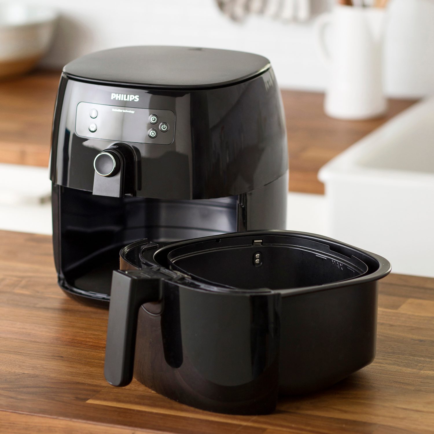 air fryer and removable basket on kitchen counter