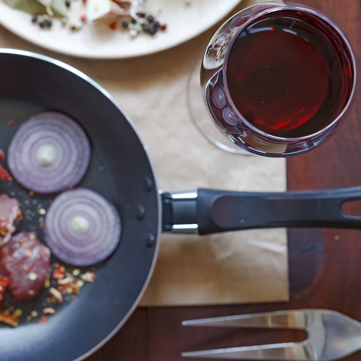 Wine in a glass and snacks.