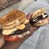 Carl's Jr.'s Newest Burger Is Using Garlic Bread For Buns