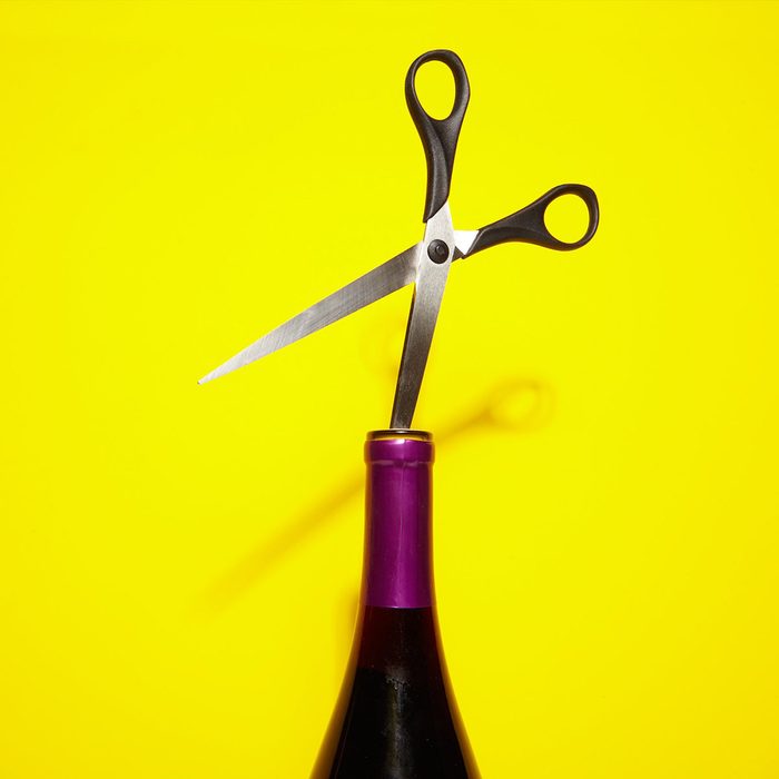 Using scissors on a wine cork