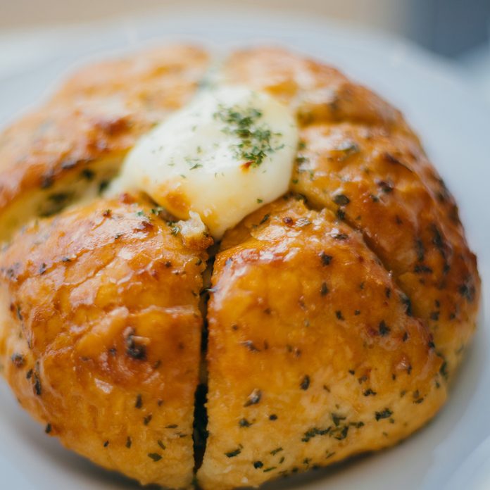 A round loaf of Korean cream cheese garlic bread.