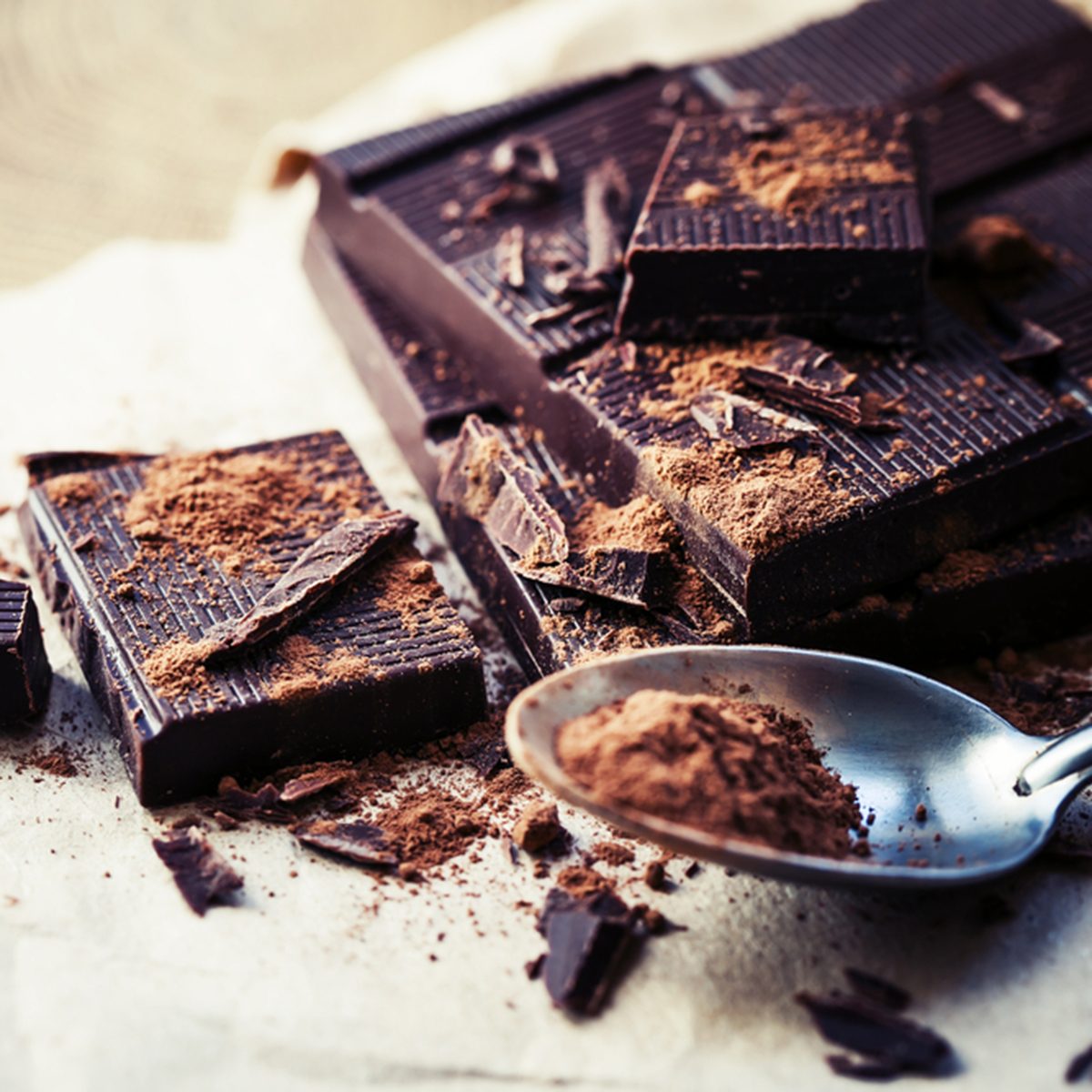 dark chocolate over wooden background