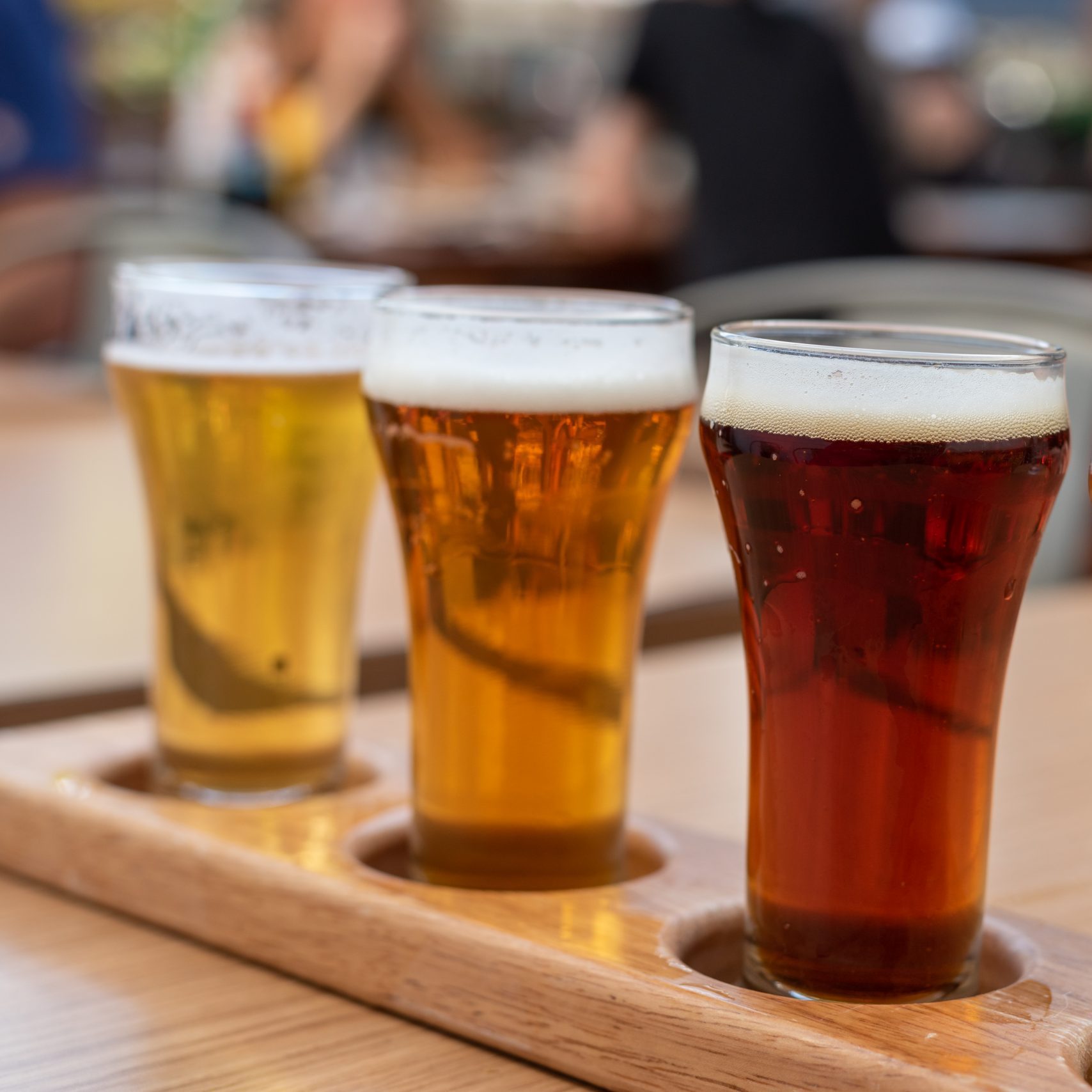 Closeup Of A Flight Of Cold Beer On A Restaurant Table