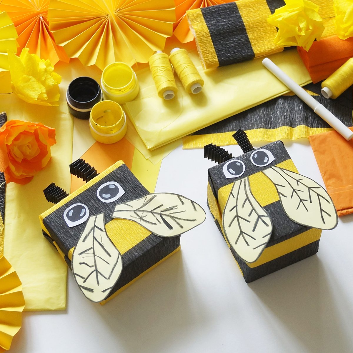 The child loves crafts bee. The child's hands. Gift packing. Materials for creativity.