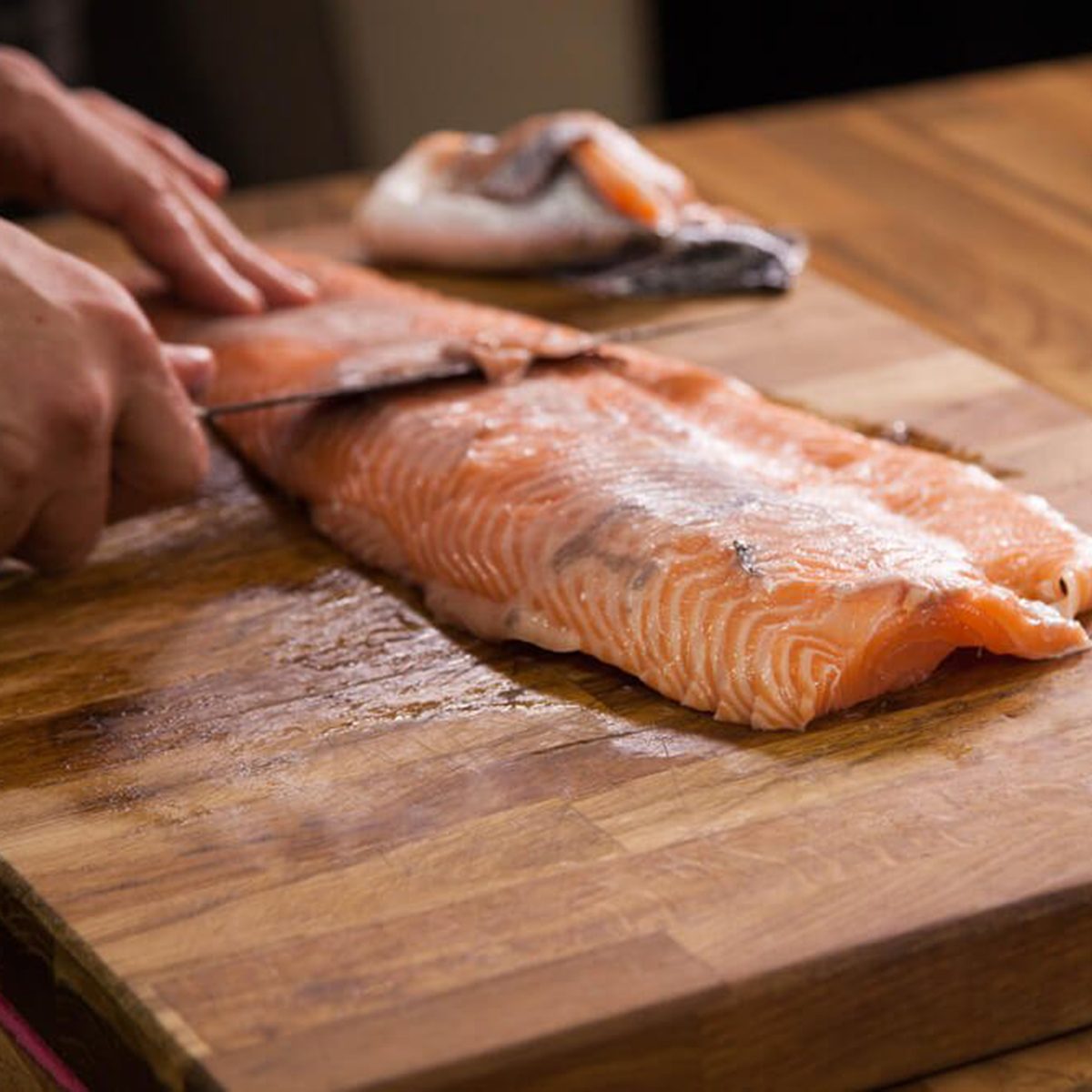 Removing the skin off of a fish