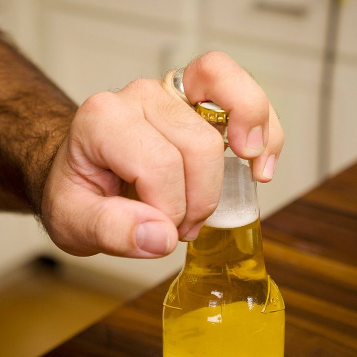 hand on a bottle