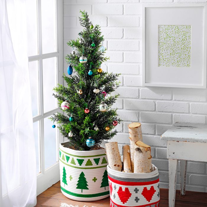 Country Woman Magazine's Painted Basket Holding Balsam Logs and Tree Seasonal Home Decor Craft Project