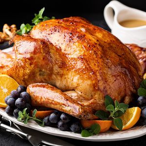 Festive celebration roasted turkey with gravy for Thanksgiving or Christmas