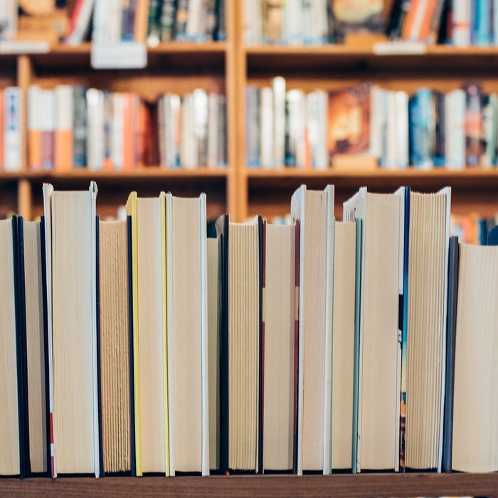 Row of backwards books in a bookstore