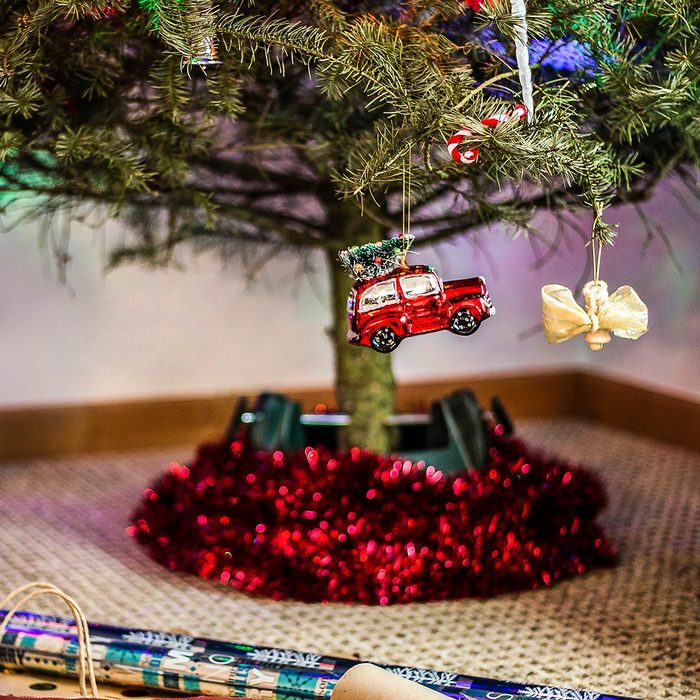 This is a photo of our Christmas tree & the craziness the happens when you're wrapping all the presents! The kiddos like to load the tree with every ornament they can find; which means sometimes some are barely hanging on.