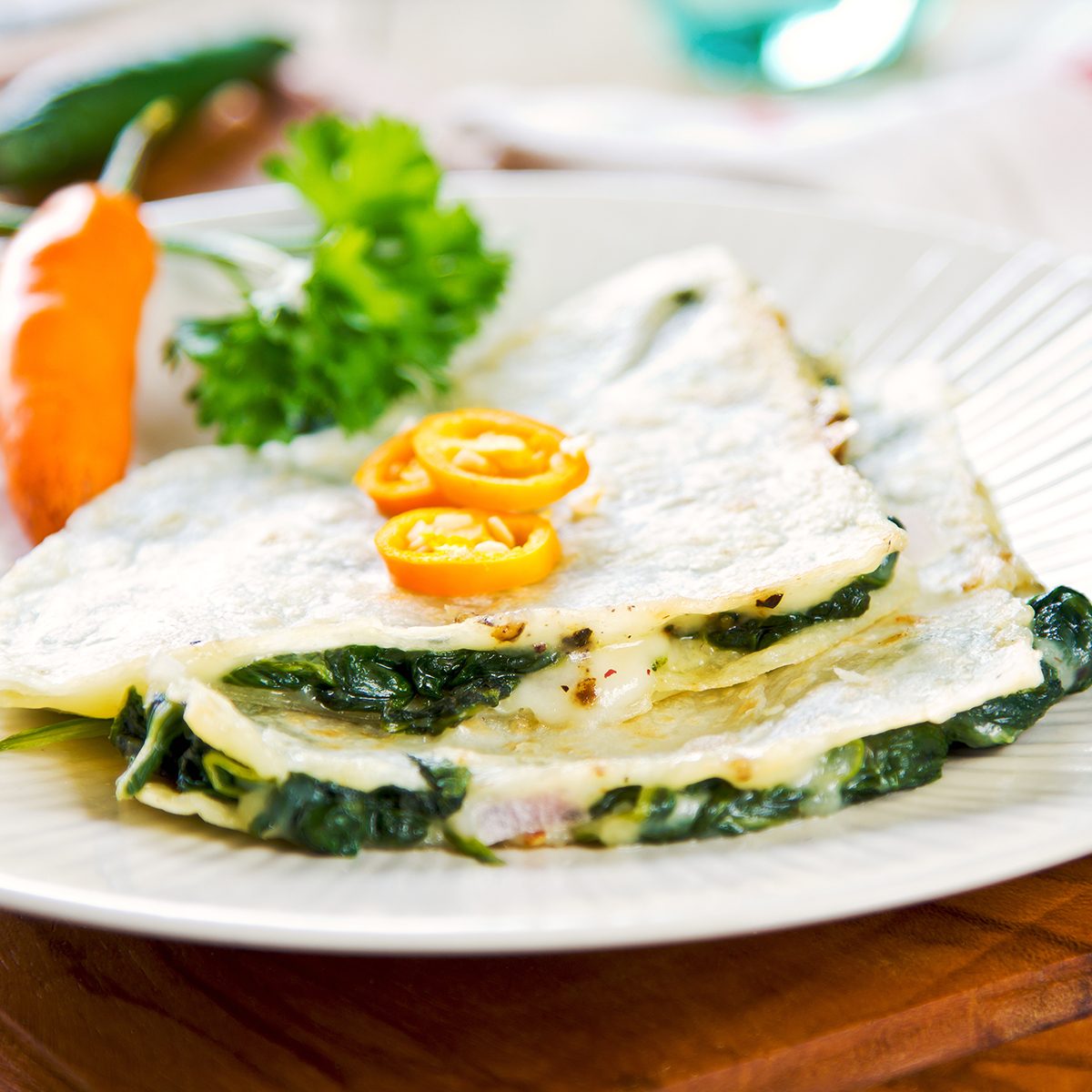 Spinach and cheese Quesadilla with chili on top