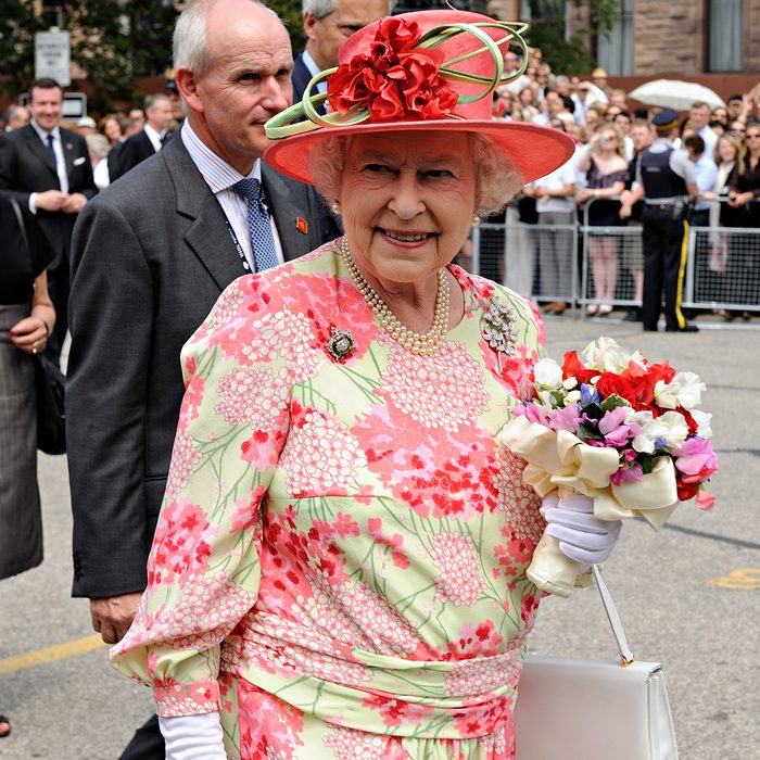 Thousands of people packed University Avenue and the grounds of Queen's Park to catch a glimpse of the Queen and the Duke of Edinburgh in Toronto