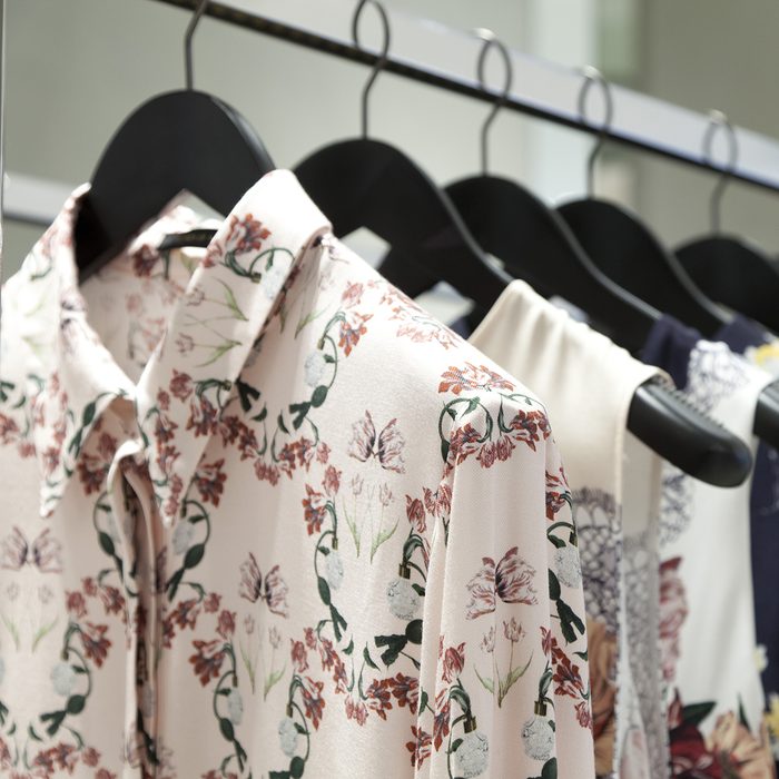 woman blouse hangs on a hanger