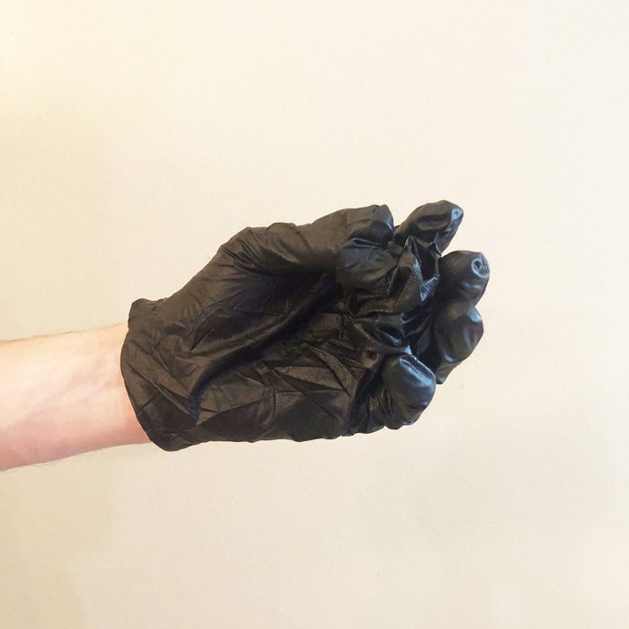 Step 3 of removing gloves