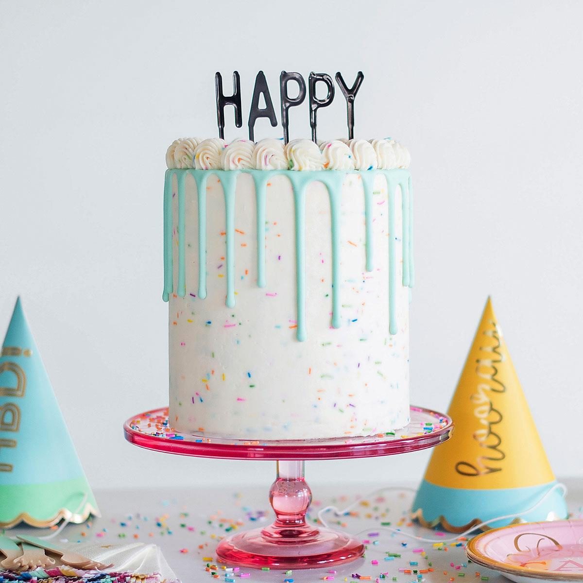 confetti birthday cake with drip icing
