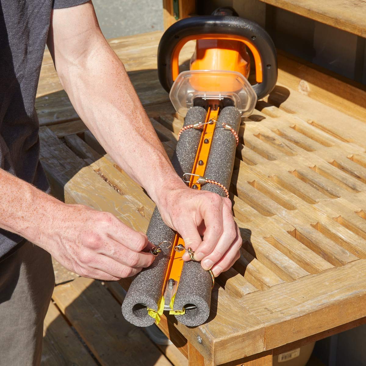 HH hedge trimmer pipe insulation bungee cord