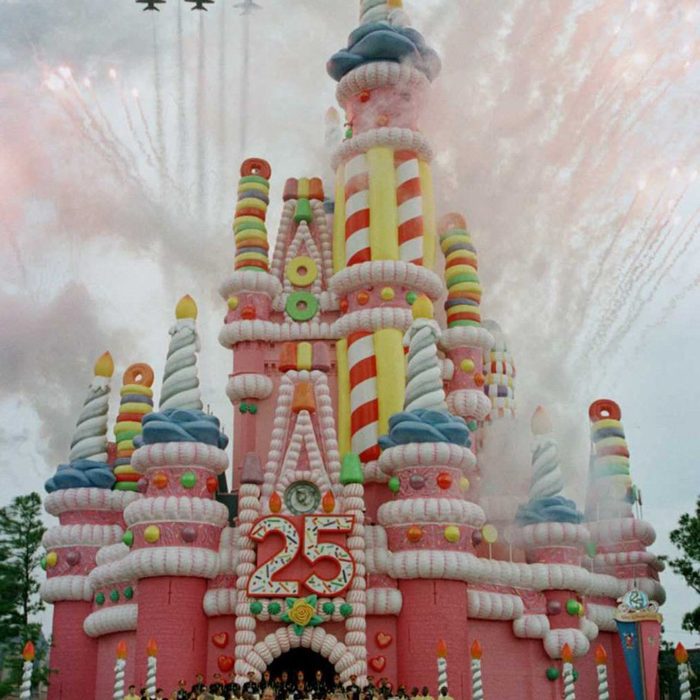 LAKE BUENA VISTA, UNITED STATES: Fireworks and six Air Force F-16 fighters fly over Cinderella's Castle during the rededication of the Magic Kingdom at Walt Disney World in Lake Buena Vista, Florida, 01 October. The Castle was decorated as a birthday cake for the 25th Anniversary of the opening of Walt Disney World. AFP PHOTO Tony RANZE (Photo credit should read TONY RANZE/AFP via Getty Images)