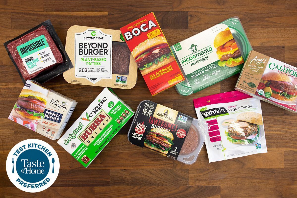 Plant-based burgers overhead on butcher block