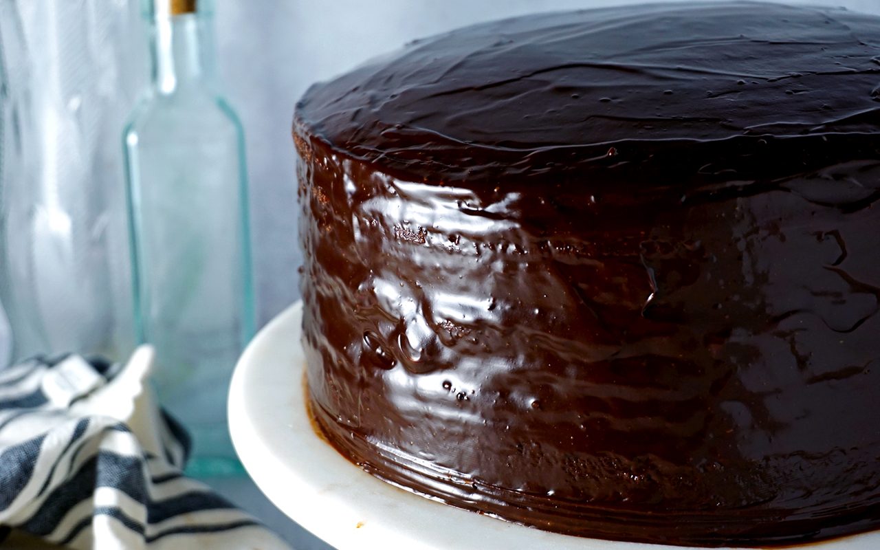 a finished smith island cake covered in homemade fudge icing