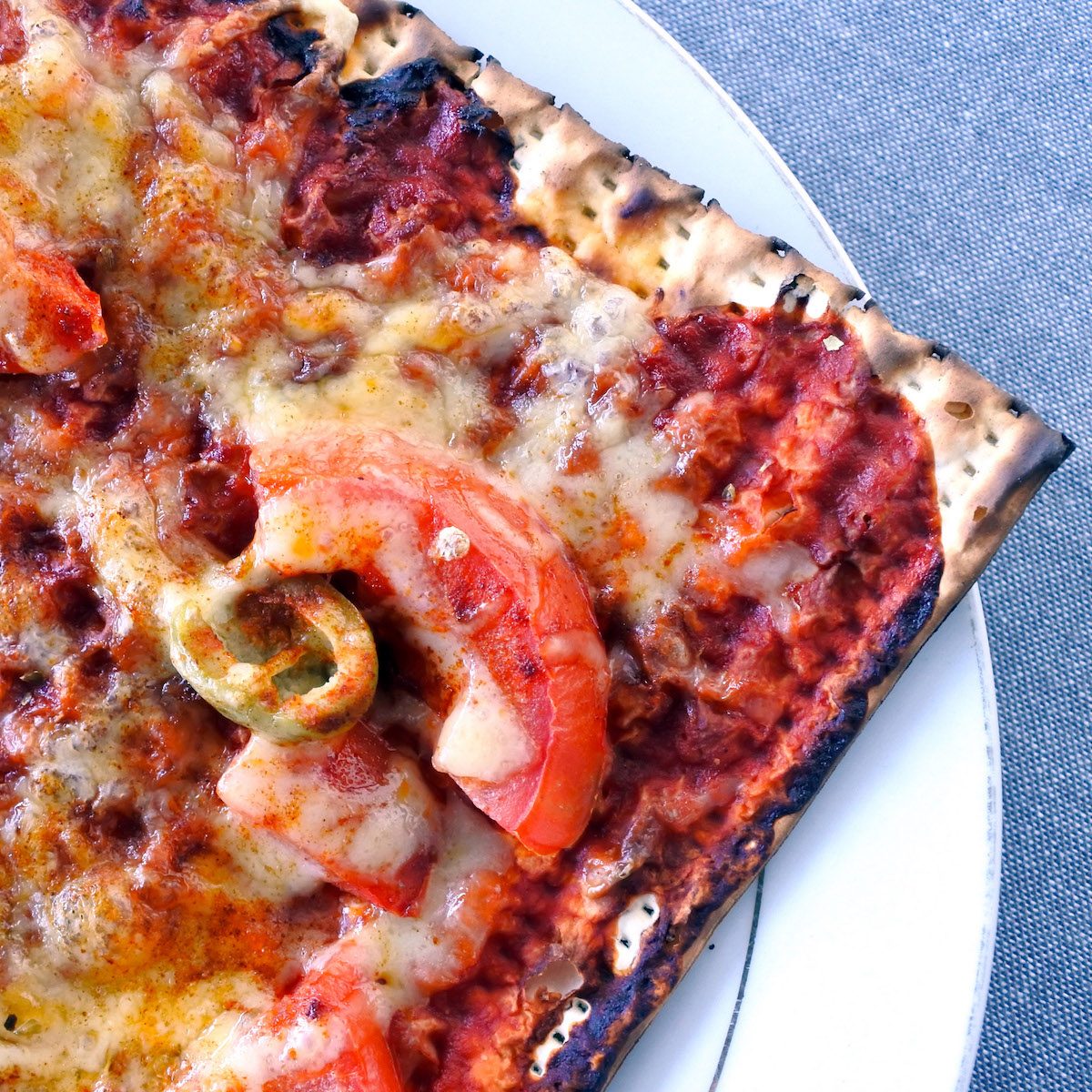 A piece of matzo pizza for Passover.