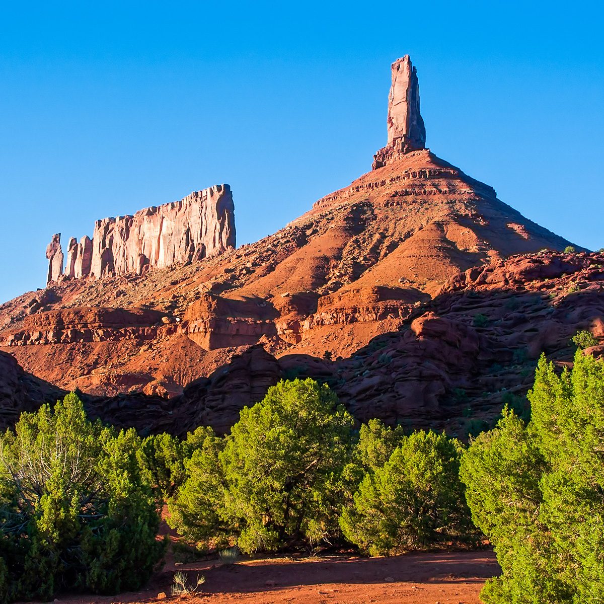 Castleton Tower (Castle Rock) and The Priest and Nuns atop Round Mountain in Utah's Castle Valley near Moab
