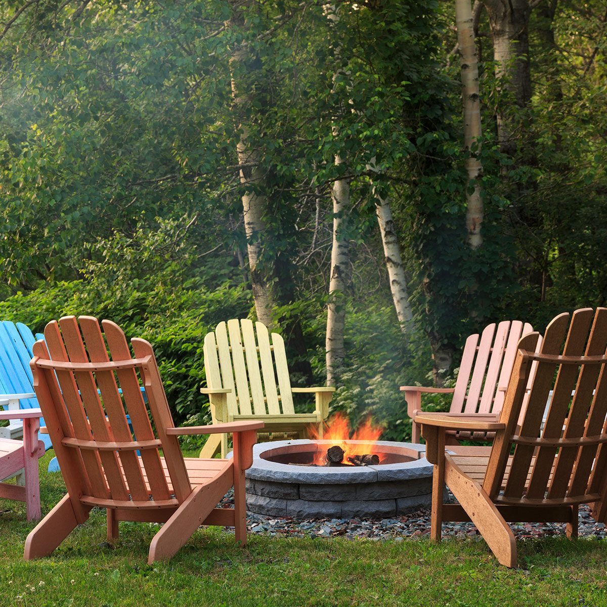 Colorful chairs around a fire pit, Crisanver Inn, VT, USA