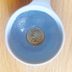 This Is Why People Leave a Quarter in a Cup of Frozen Water in the Freezer