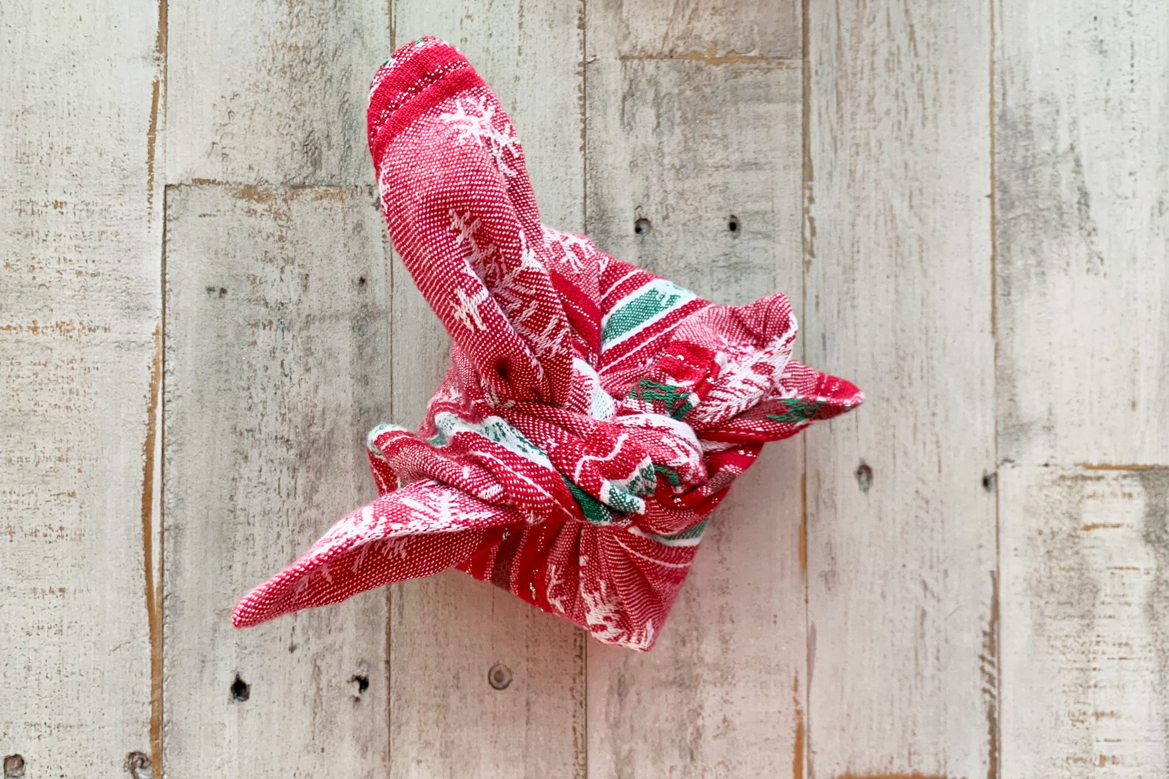 christmas gift wrapped with fabric