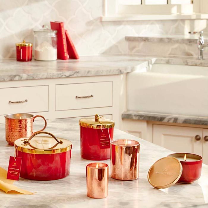 candle set out in kitchen table
