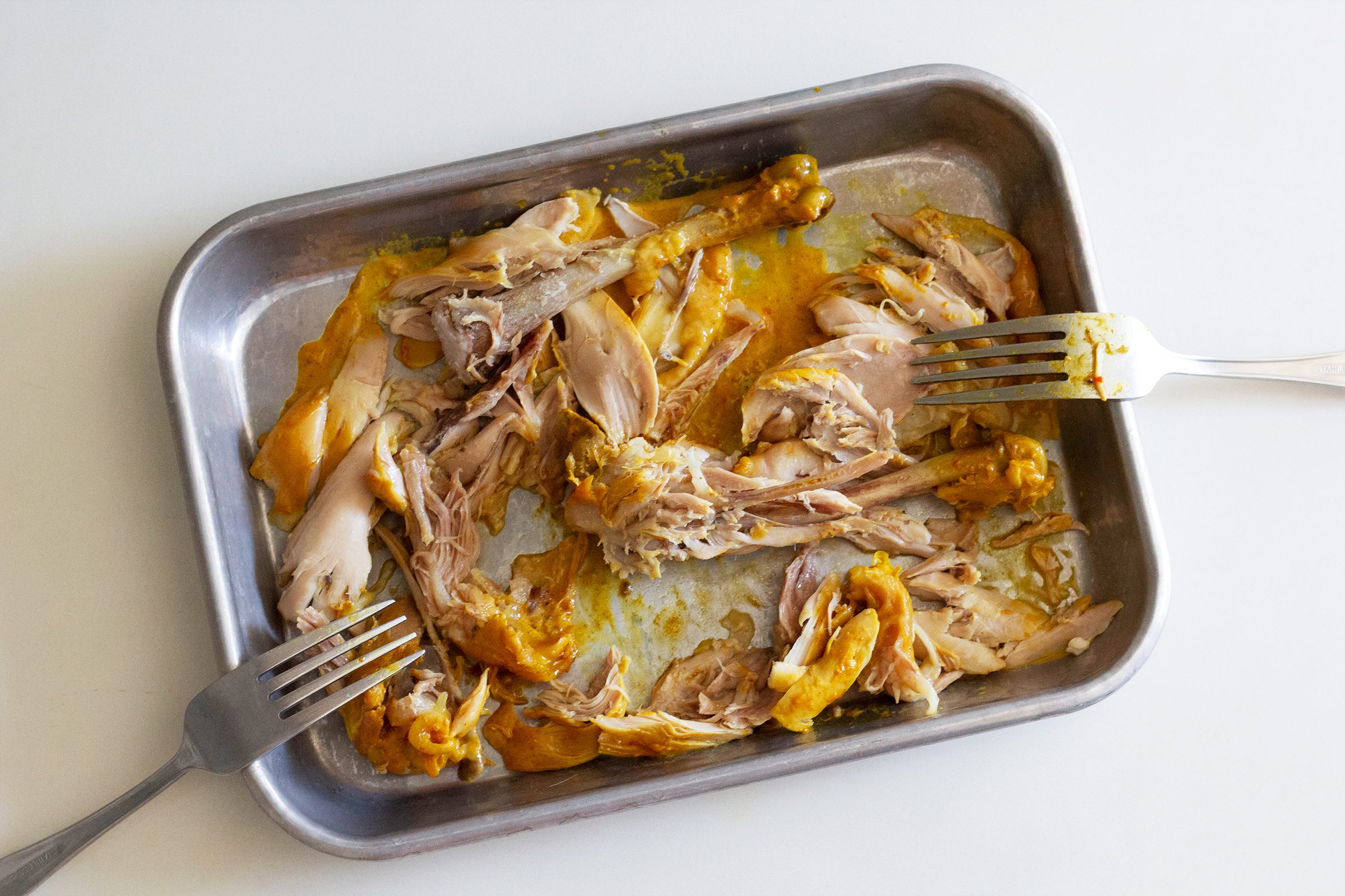 Shredding Chicken For Khao Soi
