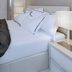 This Is How to Tuck in a Flat Sheet to Create Tight Corners
