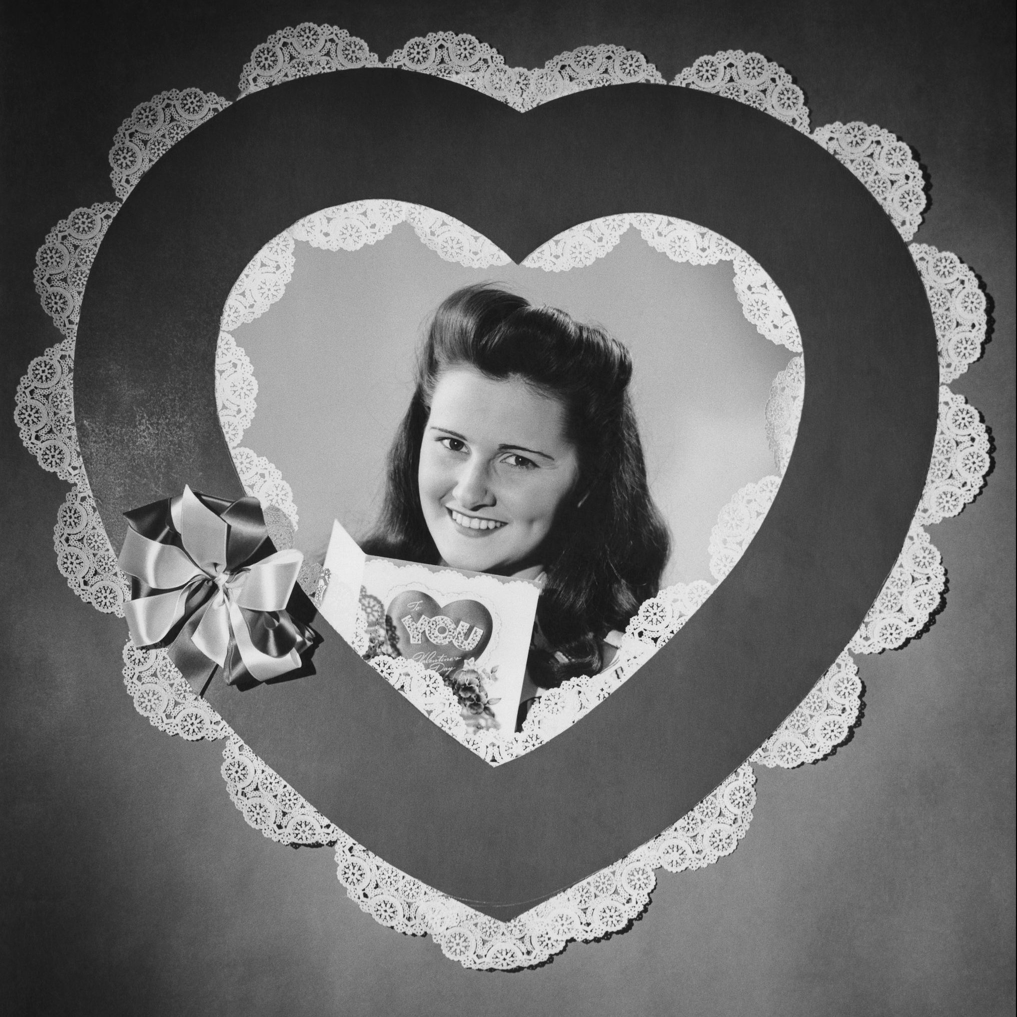 Photography Of Young Woman In Heart Shape Frame