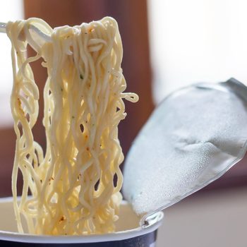 Hand Use Chopsticks To Pickup Tasty Noodlenoodle Cup Ready Made Fast Food 2