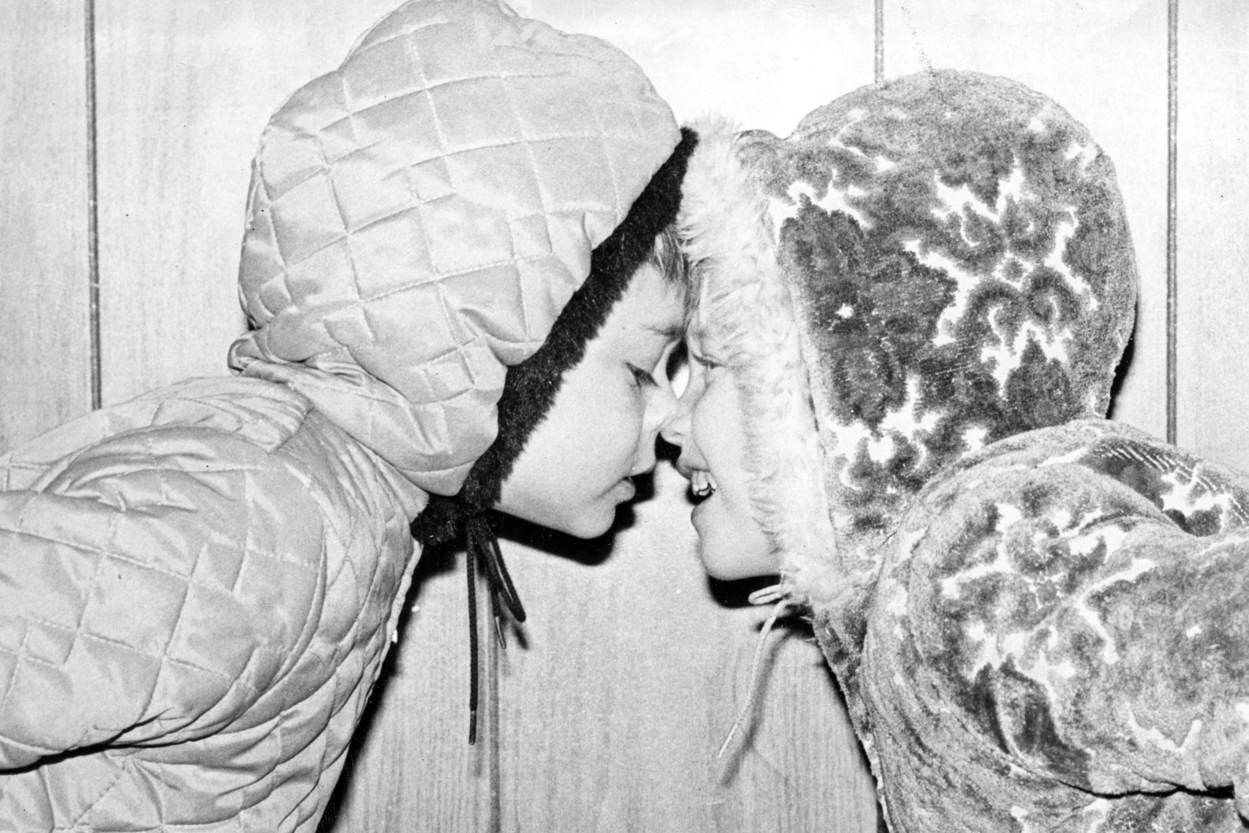 Cupid made his yearly Valentine's Day rounds today and left these little preschoolers rubbing noses Eskimo style.