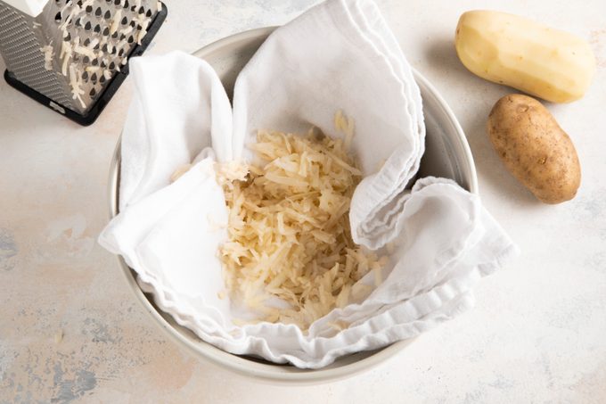 squeeze out potato liquid